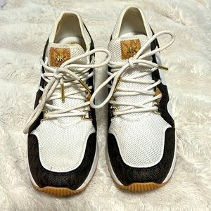 These the cutesttt michael Kors high sneakers!!!